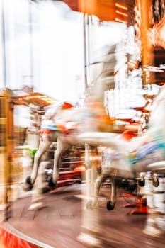 Dynamic carousel ride with vibrant motion blur, capturing the funfair excitement in Paris.